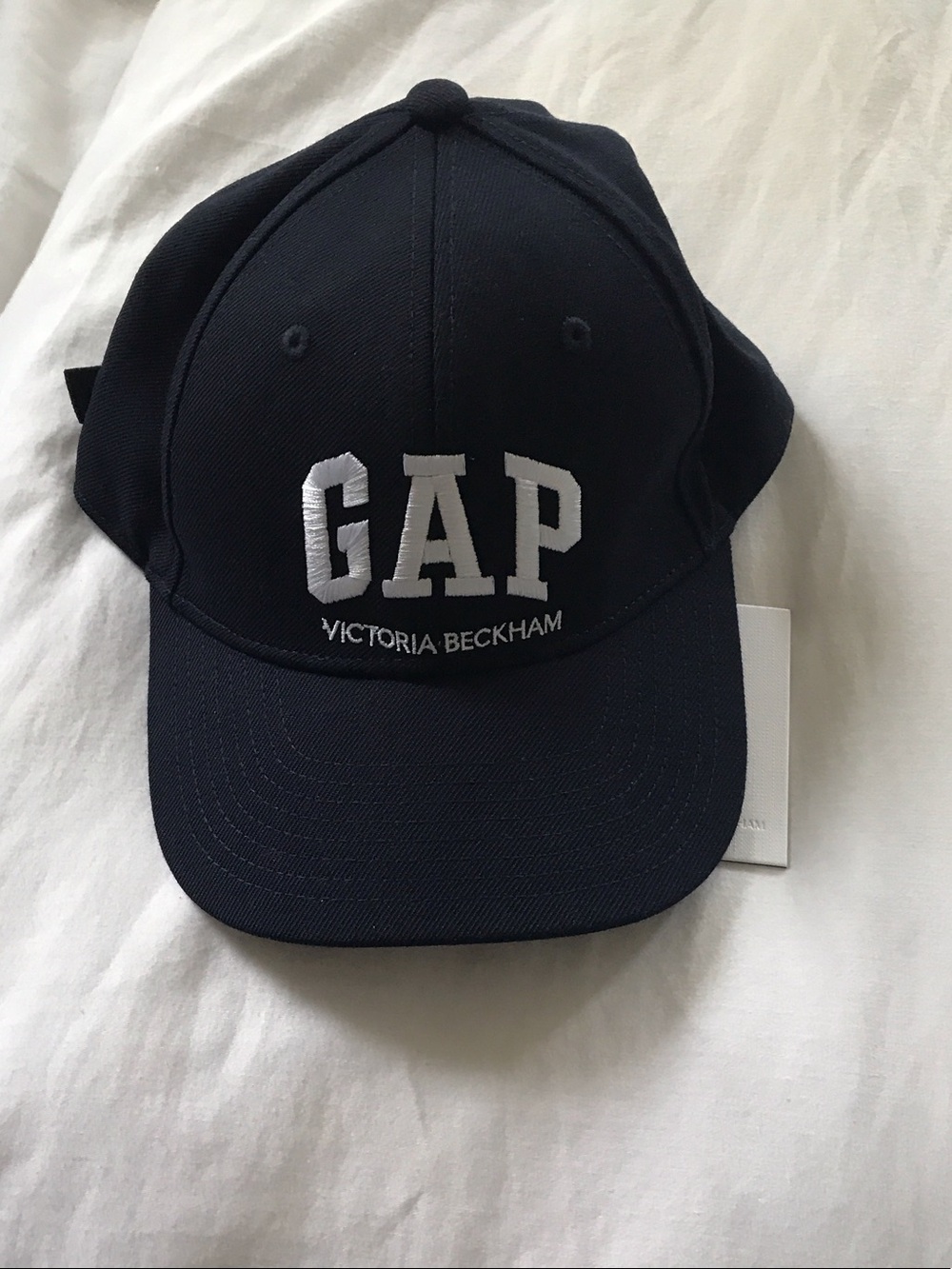 Victoria Beckham Navy Cap with White GAP Embroidery